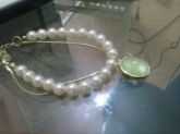 PULSEIRA PEROLA COM PIGENTE PEDRA VERDE